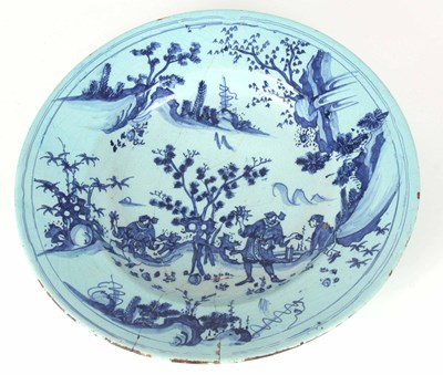 Lot 515 - AN EARLY DELFT CHARGER 39.5cm diameter with...