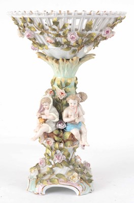 Lot 533 - A 19TH CENTURY DRESDEN PORCELAIN CENTREPIECE...