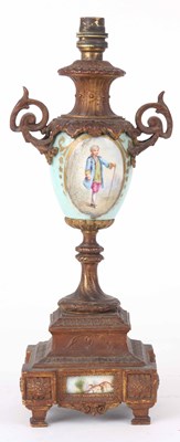 Lot 535 - A PORCELAIN AND GILT METAL LAMP 40cm high