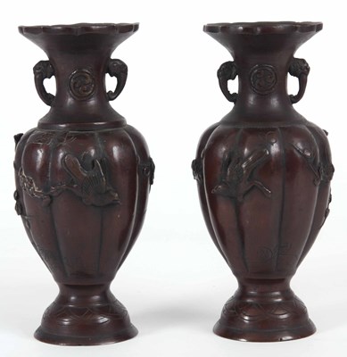 Lot 559 - A PAIR OF BRONZE MEIJI PERIOD VASES decorated...