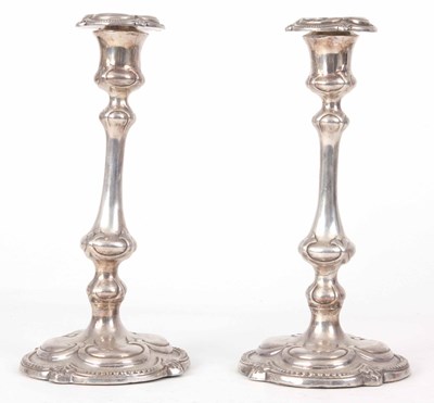 Lot 574 - A PAIR OF CONTINENTAL SILVER CANDLESTICKS with...