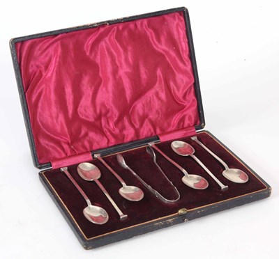 Lot 583 - A CASED SET OF SILVER COFFEE SPOONS AND TONGS...