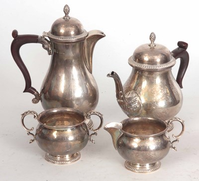 Lot 589 - A SILVER FOUR PIECE TEA AND COFFEE SET...