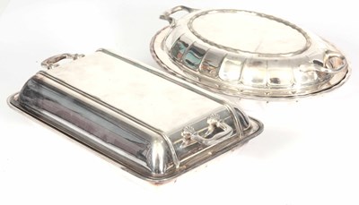 Lot 600 - TWO SILVER PLATED LIDDED TUREENS. one oval by...