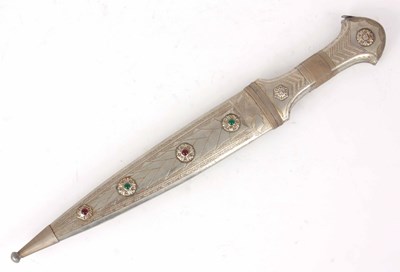 Lot 609 - A SILVER METAL JEWELLED AND ENGRAVED DAGGER...