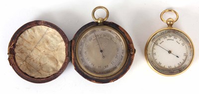 Lot 630 - A GILT LEATHER CASED POCKET BAROMETER and one...