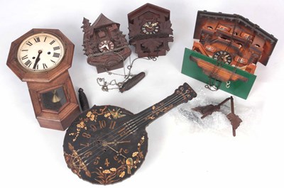 Lot 64 - THREE MODERN CUCKOO CLOCKS AND TWO OTHERS ONE...