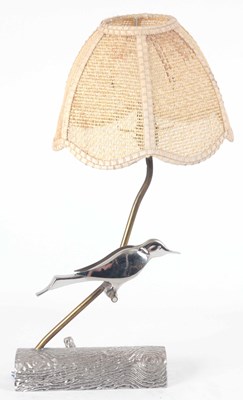 Lot 654 - A CHROME AND BRASS LAMP WITH A BIRD 50cm high