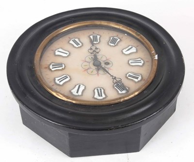 Lot 66 - A CIRCULAR EBONISED WALL CLOCK with alabaster...