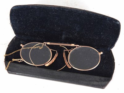 Lot 663 - A PAIR OF PINCE-NEZ SPECTACLES "TESTED " 9ct...