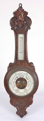 Lot 68 - AN EARLY 20th CENTURY WALL ANEROID BAROMETER...