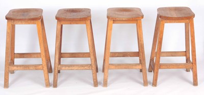 Lot 810 - A SET OF FOUR STAINED BEECH HIGH STOOLS 63cm...