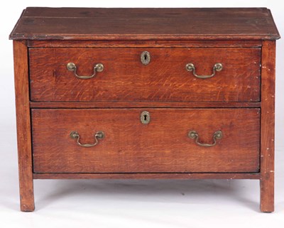 Lot 814 - AN 18TH CENTURY OAK LOW WAISTED CHEST OF...