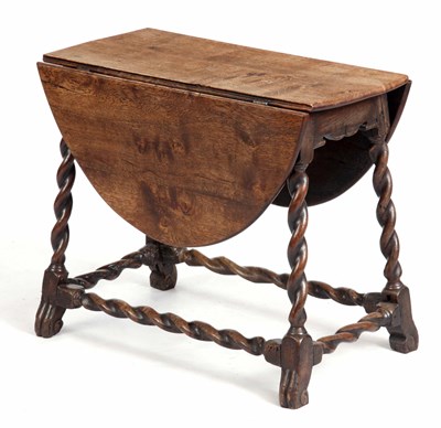 Lot 815 - A SMALL CHARLES I STYLE OAK GATELEG TABLE with...