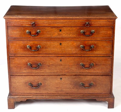 Lot 832 - A GEORGE III OAK CHEST OF DRAWERS with...