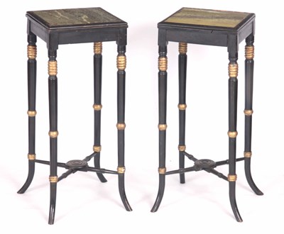 Lot 870 - A PAIR OF REGENCY STYLE EBONISED AND GILT...