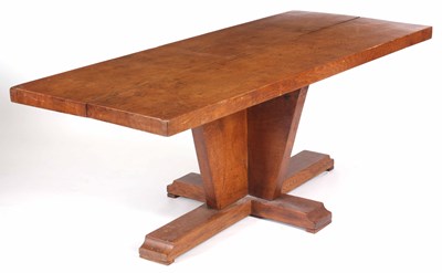 Lot 874 - A STYLISH OAK DINING TABLE with thick cut top...