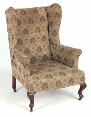 Lot 901 - A LATE 19TH CENTURY WINGBACK ARMCHAIR standing...