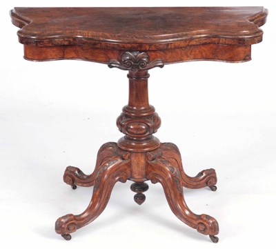 Lot 903 - A MID 19TH CENTURY FIGURED WALNUT SERPENTINE...