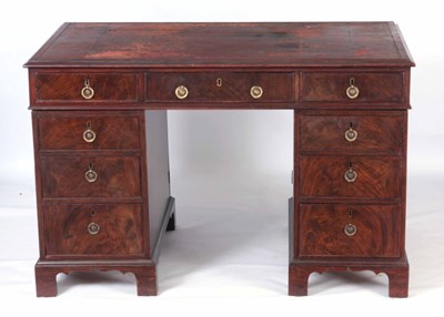 Lot 1003 - A LATE GEORGIAN FLAMED MAHOGANY PARTNERS DESK...