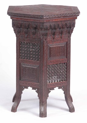 Lot 1006 - A 19TH CENTURY CARVED HEXAGONAL HARDWOOD...