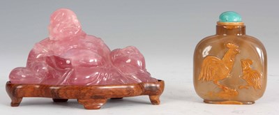 Lot 117 - A CHINESE CARVED PINK JADEITE FIGURE OF A...