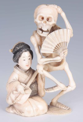 Lot 151 - A MEIJI PERIOD JAPANESE CARVED IVORY OKIMONO...