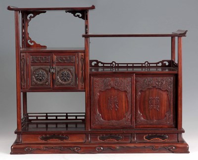 Lot 180 - A 19th CENTURY HUANGHUALI TABLE CABINET having...