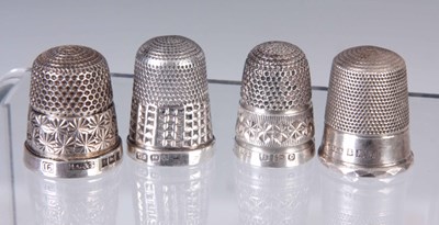 Lot 206 - A SELECTION OF FOUR SILVER THIMBLES hallmarked...