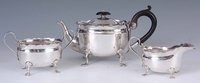 Lot 246 - A GEORGE V THREE PIECE SILVER TEA SERVICE of...