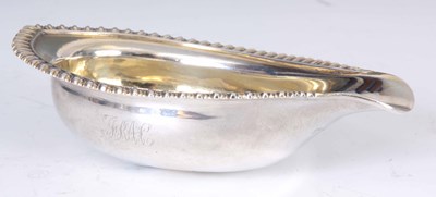 Lot 251 - A GEORGE III SILVER PAPBOAT of pointed oval...