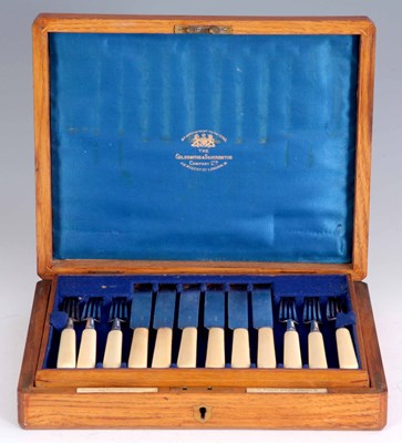 Lot 253 - A CASED SET OF 12 SILVER PLATED BONE HANDLED...