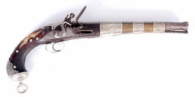 Lot 342 - AN EASTERN FLINTLOCK PISTOL with steel barrel...