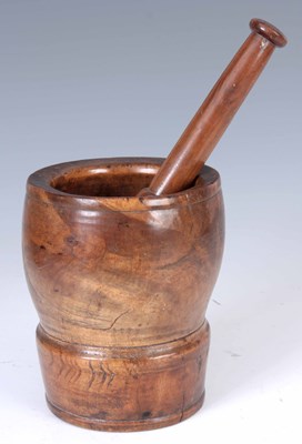 Lot 442 - A 17TH CENTURY TURNED ELM PESTLE AND MORTAR...