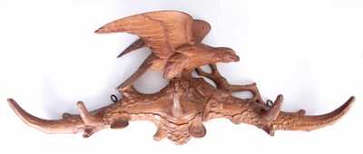 Lot 471 - A 19TH CENTURY BLACK FOREST CARVED LINDEN WOOD...