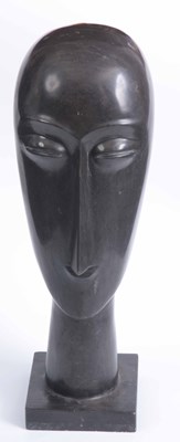 Lot 477 - A CARVED STONE HEAD IN THE MANNER OF AMEDEO...