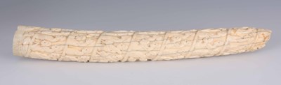 Lot 495 - A 19TH CENTURY CARVED HIPPOPOTAMUS TUSK in...