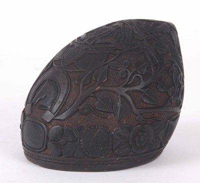 Lot 508 - A 19th CENTURY CARVED COCONUT SHELL decorated...