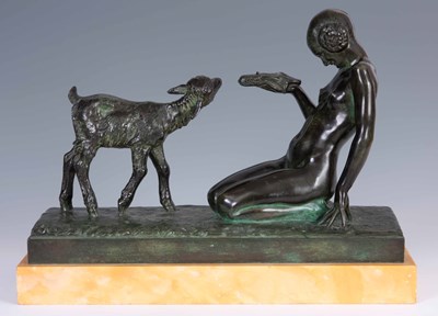 Lot 577 - COURBIER. A FRENCH ART DECO GREEN PATINATED...