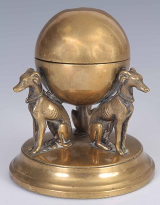 Lot 620 - A 19th CENTURY BRASS INKSTAND modelled as a...