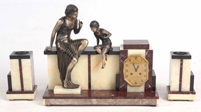 Lot 755 - A FRENCH ART DECO FIGURAL CLOCK GARNITURE the...