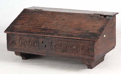 Lot 837 - A 17TH CENTURY OAK SLOPE FRONT DESK BOX...