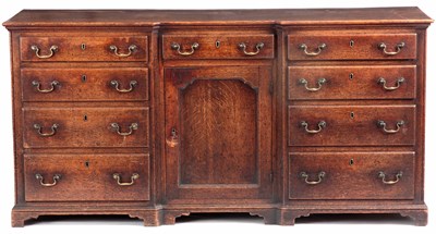 Lot 844 - AN 18TH CENTURY FIGURED OAK INVERTED...