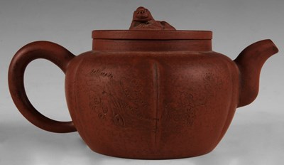 Lot 92 - A Chinese Terracotta TEAPOT and COVER with dog...