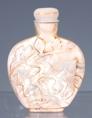 Lot 87 - A MOTHER OF PEARL CHINESE SNUFF BOTTLE carved...