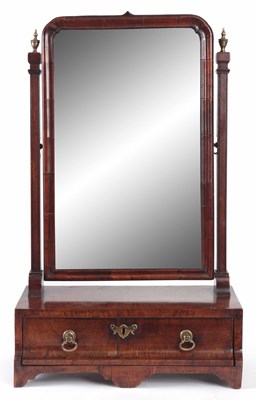 Lot 884 - A GEORGE I FIGURED WALNUT TOILET MIRROR with...