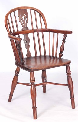 Lot 887 - A 19TH CENTURY YEW-WOOD LOWBACK WINDSOR CHAIR...