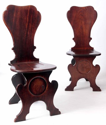 Lot 903 - A PAIR OF GEORGE II MAHOGANY HALL CHAIRS OF...