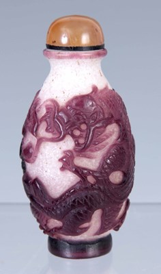 Lot 91 - A CHINESE WHITE SPECKLE AND PURPLE GLASS CAMEO...