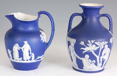 Lot 21 - A WEDGWOOD BLUE AND WHITE JASPERWARE TWO...